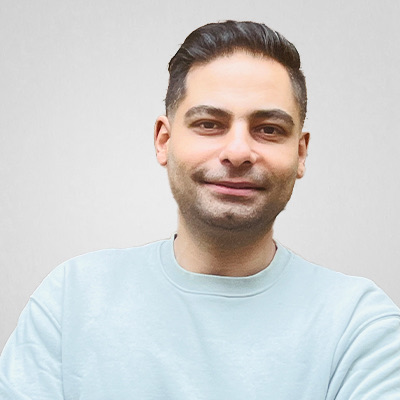 Headshot of Sepehr Pandsheno in a light blue sweatshirt.
